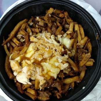 Dunn's - Rip-off poutine. Thanks for no cheese, no chicken and no caring about serving this to customers. - Poutineries Near Me - Montreal, Quebec