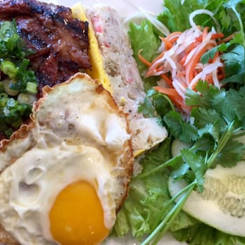 Viet Garden Restaurant - Com Tam with grilled pork chops, pork patty, and sunny sided egg. - Vietnamese Near Me - Baton Rouge, Louisiana Viet Garden Restaurant - Com Tam with grilled pork chops, pork patty, and sunny sided egg. - Vietnamese Near Me - Baton Rouge, Louisiana