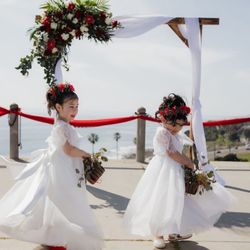 Flower girls with their headbands and textured high bun!