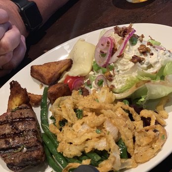 Houlihan's - Steak and wedge salad (onion crisps were from the pot roast- not the salad) - New American Near Me - Hershey, Pennsylvania Houlihan's - Steak and wedge salad (onion crisps were from the pot roast- not the salad) - New American Near Me - Hershey, Pennsylvania