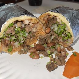 Carne Asada burrito / rice, beans, onion and cilantro