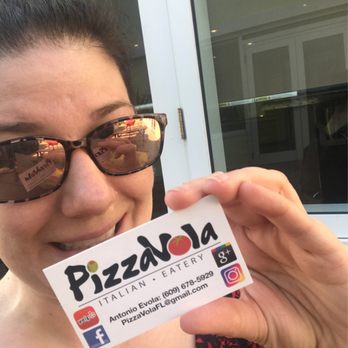 PizzaVola - A dork holding a business card.... - Pizza Near Me - Cocoa Beach, Florida PizzaVola - A dork holding a business card.... - Pizza Near Me - Cocoa Beach, Florida