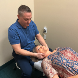 LivingWell Chiropractic - Dr. Timothy Sopp Adjusting Neck