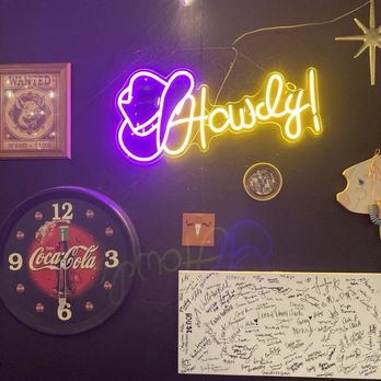 Petunia's BBQ - Fun wall with local artist work. I spy a Brenna Bonita Art. - Barbeque Near Me - Purvis, Mississippi Petunia's BBQ - Fun wall with local artist work. I spy a Brenna Bonita Art. - Barbeque Near Me - Purvis, Mississippi