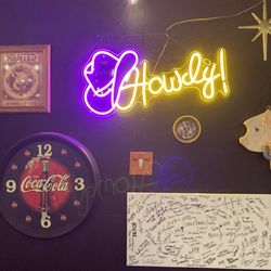 Petunia's BBQ - Fun wall with local artist work. I spy a Brenna Bonita Art.