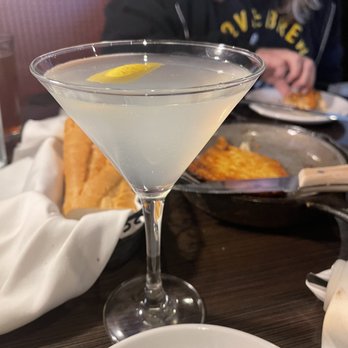 BlackStone - Martini and background is Saganaki - American Near Me - Iowa City, Iowa