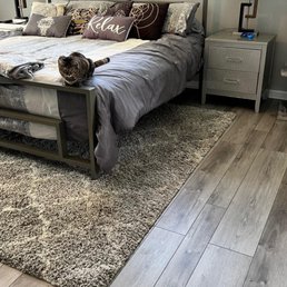 Even cat approved! Martin and installed a gray laminate NuCore flooring. Beautiful work!