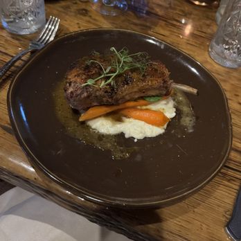 Earth at Hidden Pond - Iberico Pork Chop with smoked cheddar polenta, fiddleheads and maple carrots - New American Near Me - Kennebunkport, Maine Earth at Hidden Pond - Iberico Pork Chop with smoked cheddar polenta, fiddleheads and maple carrots - New American Near Me - Kennebunkport, Maine
