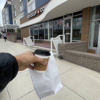 Revocup Lenexa Coffee Shop - Small Ethiopian macchiato with a chocolate chip scone - Coffee & Tea Near Me - Lenexa, Kansas