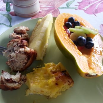 Hilo Bay Hale Bed & Breakfast - Munching on the delicious breakfast. Yum! - Bed & Breakfast Near Me - Hilo, Hawaii Hilo Bay Hale Bed & Breakfast - Munching on the delicious breakfast. Yum! - Bed & Breakfast Near Me - Hilo, Hawaii