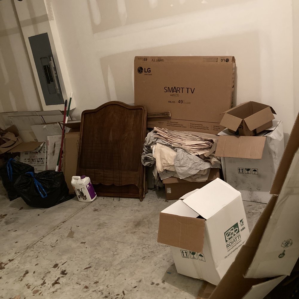 Ginter Services - Boxes, broken head board and nicknacks left behind. - Handyman Near Me - Yorktown, Virginia
