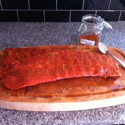 Some delicious ribs I picked up @ Acme.  Rubbed 'em, smoked 'em, put 'em on coal and ate'em.  nothing left but the bones.