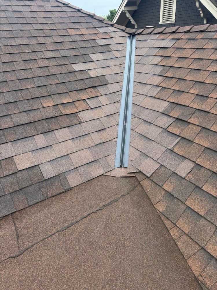 Slide of Renergy  Roofing