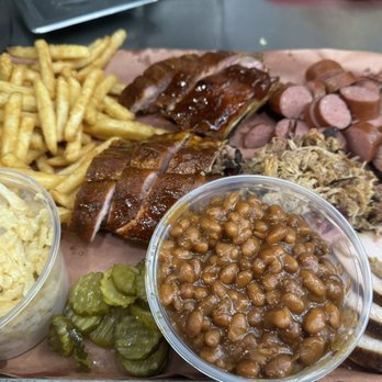 Barrel Smoke BBQ - This is called the good stuff. Half a rack of ribs, 1/ 3rd pound of all four smoked meats, and 3 pounds of sides. - Barbeque Near Me