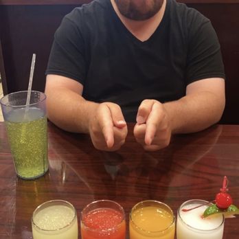 San Antonio Mexican Restaurant - My Margarita sampler. From left to right: lime, strawberry, mango, piña colada. - Mexican Near Me - Wisconsin Dells, Wisconsin San Antonio Mexican Restaurant - My Margarita sampler. From left to right: lime, strawberry, mango, piña colada. - Mexican Near Me - Wisconsin Dells, Wisconsin