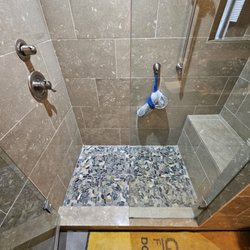 Gold Standard Floor Care - Limestone shower cleaning and restoration.