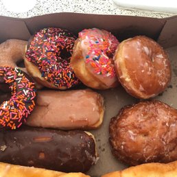 a variety of donuts in a box a variety of donuts in a box