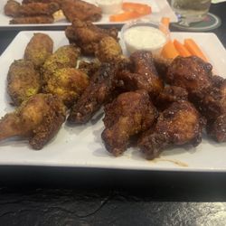 The Bull - Pub & Grill - Lemon pepper (left) whiskey bbq (right) 2lbs wings