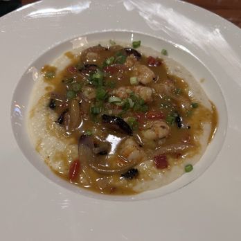 Harper's Table - SHRIMP 'N GRITS stone-ground grits, our andouille, chardonnay butter - New American Near Me - Suffolk, Virginia Harper's Table - SHRIMP 'N GRITS stone-ground grits, our andouille, chardonnay butter - New American Near Me - Suffolk, Virginia