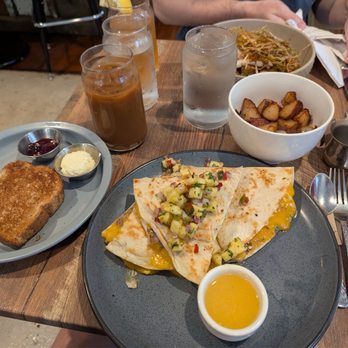 Two Birds Cafe - Breakfast quesadilla with pineapple salsa, side of toast with house jam and whipped butter, breakfast potatoes, breakfast hash - Cafes Near Me - West Chester, Pennsylvania Two Birds Cafe - Breakfast quesadilla with pineapple salsa, side of toast with house jam and whipped butter, breakfast potatoes, breakfast hash - Cafes Near Me - West Chester, Pennsylvania