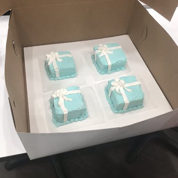 Great American Cookies - a box of four blue cakes - Bakeries Near Me - Houston, Texas