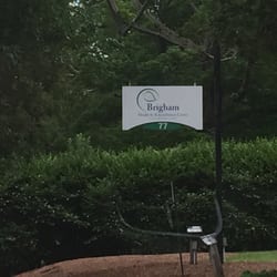 Brigham Manor Nursing and Rehabilitation Center - Brigham Manor's sign out front.