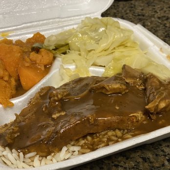 The Greasy Spoon - Smothered Pork Chop, Combo Cabbage, and Candied Yams - Soul Food Near Me - Houston, Texas The Greasy Spoon - Smothered Pork Chop, Combo Cabbage, and Candied Yams - Soul Food Near Me - Houston, Texas