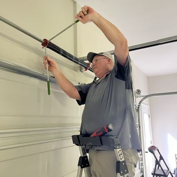 Norm's Garage Door Service - Replacing a spring. Setting the tension. - Garage Door Services Near Me - Dalton, Georgia Norm's Garage Door Service - Replacing a spring. Setting the tension. - Garage Door Services Near Me - Dalton, Georgia