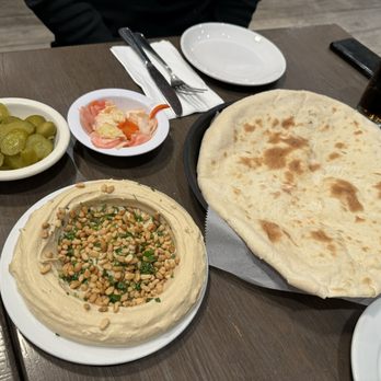 Hummus Bar & Grill - Pine Nuts Hummus, fresh warm bread - Mediterranean Near Me - Tarzana, California Hummus Bar & Grill - Pine Nuts Hummus, fresh warm bread - Mediterranean Near Me - Tarzana, California