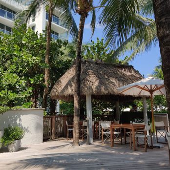 Bungalow By The Sea - an outdoor dining area - New American Near Me - Miami Beach, Florida