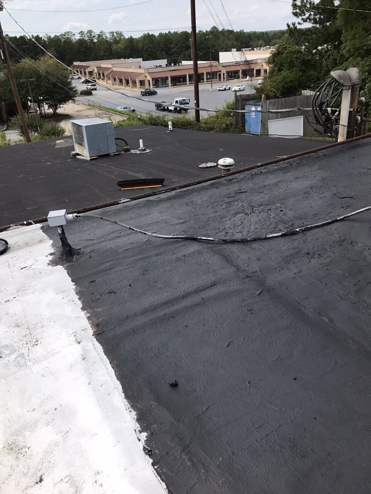 Slide of Mike Adams Roofing