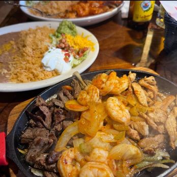 Rancho Hacienda Real - Trio Fajitas include Steak, Chicken and Shrimp with rice beans and fresh hand made tortillas. Absolutely Delicious!!! - Mexican Near Me - Albany, Oregon Rancho Hacienda Real - Trio Fajitas include Steak, Chicken and Shrimp with rice beans and fresh hand made tortillas. Absolutely Delicious!!! - Mexican Near Me - Albany, Oregon