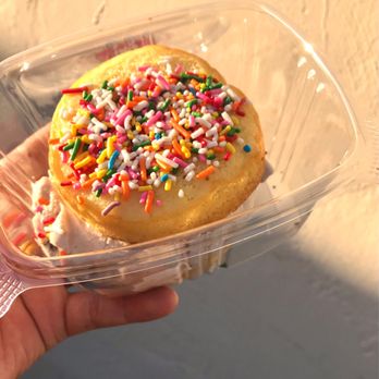 JAMZ Creamery - a hand holding a donut with sprinkles - Ice Cream & Frozen Yogurt Near Me - Inglewood, California