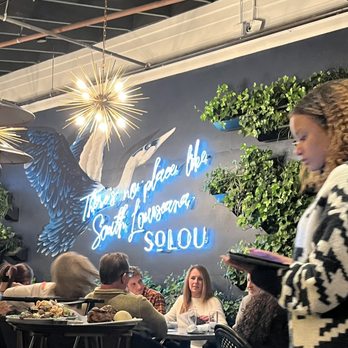 SoLou - Decor/ selfie wall if that table isn't occupied with guest - New American Near Me - Baton Rouge, Louisiana SoLou - Decor/ selfie wall if that table isn't occupied with guest - New American Near Me - Baton Rouge, Louisiana