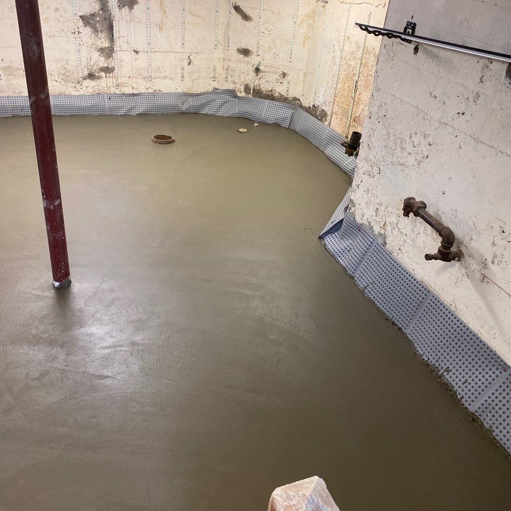 Drycrete Waterproofing - our new concrete floor just having been poured - Waterproofing Near Me - Walpole, Massachusetts