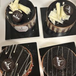 Paris Rendez-Vous - Excellence (crème brûlée and chocolate ganache) and Framboisine (raspberry jam and chocolate ganache) cakes