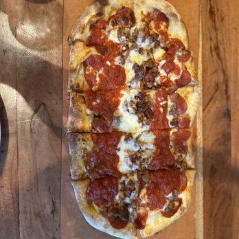 The Naked Olive - Meat lovers brick oven pizza. - Mediterranean Near Me - Kennett Square, Pennsylvania The Naked Olive - Meat lovers brick oven pizza. - Mediterranean Near Me - Kennett Square, Pennsylvania
