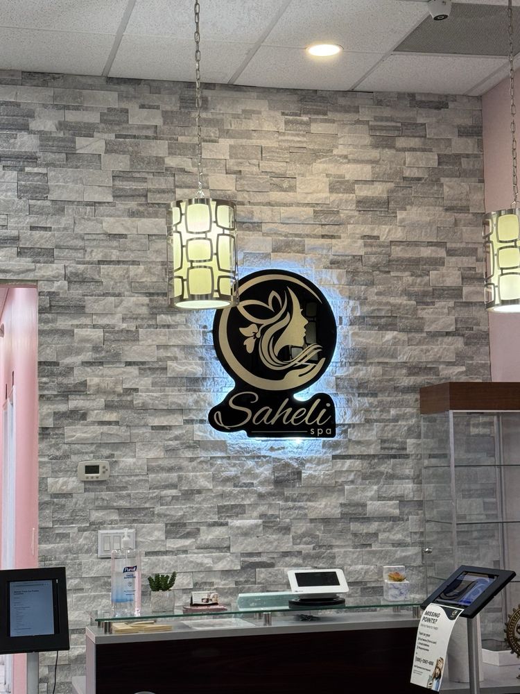 Saheli Eyebrow Threading Beauty Salon Logo