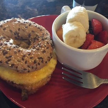 Just Java Coffee - Egg and sausage on whole grain bagel with side of fruit - Coffee & Tea Near Me - Bermuda Dunes, California