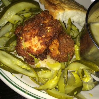 Jacob's Pickles - Honey Chicken and Pickles Biscuit Sandwich with Cheese Grits. HIGHLY RECOMMEND. DELICIOUS! love the pairing of the honey with the chicken - Comfort Food Near Me - New York, New York