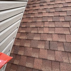 Soapy Glass Cleaning Services - after photo of a roof wash