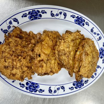 Rico food - a plate of fried chicken on a table - Asian Fusion Near Me - El Centro, California Rico food - a plate of fried chicken on a table - Asian Fusion Near Me - El Centro, California