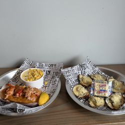 Lobster roll, creamed corn and oysters Rockefeller