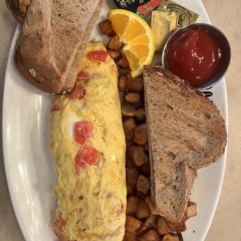 Greenstreet Cafe - Goat Cheese & Tomato Omelette - Breakfast & Brunch Near Me - Miami, Florida Greenstreet Cafe - Goat Cheese & Tomato Omelette - Breakfast & Brunch Near Me - Miami, Florida