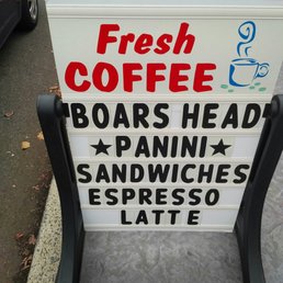 a sign for a coffee shop