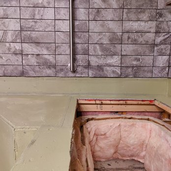 Raptor Electric & General Contractor - Hydroban installed on tub surround before re-tiling and reinstalling tub - Electricians Near Me - Austin, Texas Raptor Electric & General Contractor - Hydroban installed on tub surround before re-tiling and reinstalling tub - Electricians Near Me - Austin, Texas