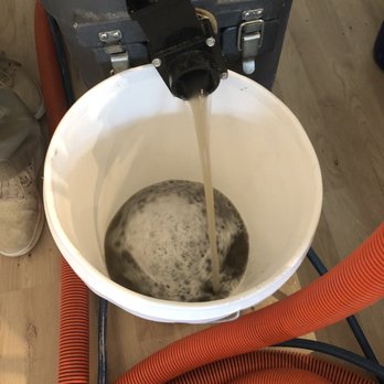 Greensafe Carpet and Floor Cleaning - Grime they removed from 1 white chair cushion and my 15-year old area rug - Carpet Cleaning Near Me - McLean, Virginia