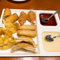 Udon Thai and Sushi - UDON SAMPLER
A combination of 2 spring rolls, 2 crab Rangoon, 2 pot stickers, 2 butterfly shrimp, 1 chicken egg roll.