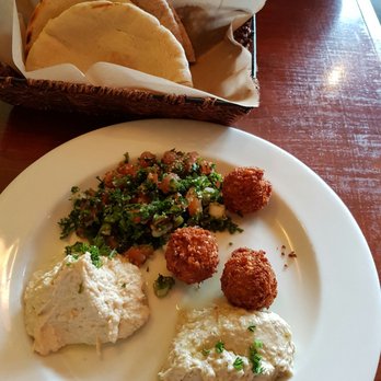 Tabule Restaurant - Combination plate with hummus, tabule, babaganuj and falafel. Served with warm pita bread - Middle Eastern Near Me - Toronto, Ontario Tabule Restaurant - Combination plate with hummus, tabule, babaganuj and falafel. Served with warm pita bread - Middle Eastern Near Me - Toronto, Ontario
