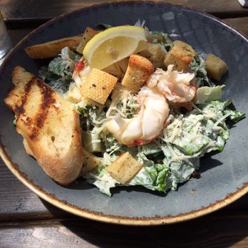 Blue Mussel Cafe - Caesar Salad ($10) added with lobster (add $11). The portion is quite a lot for lunch. - Seafood Near Me - Rustico, Prince Edward Island